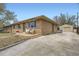 Charming brick home with a driveway, garage and a manicured front yard at 7950 Maria St, Westminster, CO 80030