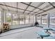 Bright sunroom with large windows offering lots of natural light at 7950 Maria St, Westminster, CO 80030