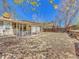 Spacious backyard with covered patio is perfect for entertaining and outdoor living at 2675 S Carson Way, Aurora, CO 80014