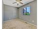 Cozy bedroom features carpeted floors, neutral paint, and a bright window for natural light at 2675 S Carson Way, Aurora, CO 80014
