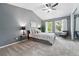 Serene bedroom with vaulted ceilings, plush carpet, and neutral tones at 3300 W Florida Ave # 117, Denver, CO 80219