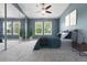 Stylish bedroom features a large closet, plush carpet, and plenty of natural light at 3300 W Florida Ave # 117, Denver, CO 80219