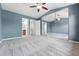Spacious bedroom with ensuite bathroom and mirrored closet at 3300 W Florida Ave # 117, Denver, CO 80219