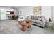 Bright living room with open floorplan, modern decor, and plenty of natural light at 3300 W Florida Ave # 117, Denver, CO 80219