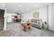 Bright living room with open floorplan, modern decor, and plenty of natural light at 3300 W Florida Ave # 117, Denver, CO 80219