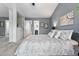 Inviting main bedroom with neutral tones and ensuite bathroom access at 3300 W Florida Ave # 117, Denver, CO 80219