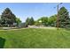 Community park area with sport court and green space at 3300 W Florida Ave # 117, Denver, CO 80219