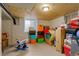This unfinished basement is filled with storage and has a small window for natural light at 1428 S County Road 23E, Berthoud, CO 80513