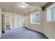 The carpeted basement is unfinished and includes closet and access to the exterior at 1428 S County Road 23E, Berthoud, CO 80513