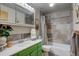 Modern bathroom with stylish vanity, decorative mirror and tiled shower at 1428 S County Road 23E, Berthoud, CO 80513