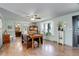 Inviting dining area with hardwood floors, large bay window, and stylish decor at 1428 S County Road 23E, Berthoud, CO 80513