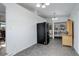 A kitchen with a large pantry and stainless steel refrigerator at 1428 S County Road 23E, Berthoud, CO 80513