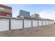 Row of garages showing parking options with driveways for the property at 1270 Winona Ct, Denver, CO 80204