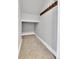 Spacious walk-in closet with ample storage space and a row of hooks for hanging items at 1270 Winona Ct, Denver, CO 80204