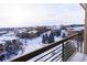 Aerial view of snow-covered community at 10111 Inverness Main St # 425, Englewood, CO 80112