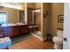 Main bathroom with double vanity and walk-in shower at 10111 Inverness Main St # 425, Englewood, CO 80112