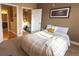 Bright bedroom with a queen-size bed and large closet at 10111 Inverness Main St # 425, Englewood, CO 80112