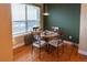 Cozy dining area with a round table and four chairs at 10111 Inverness Main St # 425, Englewood, CO 80112