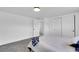 Spacious bedroom with soft gray carpet, closet and bright white walls at 4642 Everett Ct, Wheat Ridge, CO 80033