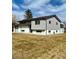 Well-maintained home featuring two stories, gray siding, and a manicured lawn at 4642 Everett Ct, Wheat Ridge, CO 80033