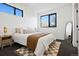 Bright bedroom with natural light, neutral color scheme and stylish decor at 1601 Park Ave # 216, Denver, CO 80218
