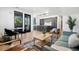Open concept living area with kitchen, dining and comfortable seating at 1601 Park Ave # 216, Denver, CO 80218