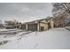 Townhouse exterior with attached garage at 11919 E Yale Ave, Aurora, CO 80014