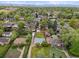 Aerial view of a home with a large backyard and surrounding neighborhood at 2681 Leyden St, Denver, CO 80207