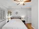 Charming bedroom with hardwood floors, bright windows, and modern decor at 2681 Leyden St, Denver, CO 80207