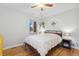 Comfortable bedroom with hardwood floors, ceiling fan, and lots of natural light at 2681 Leyden St, Denver, CO 80207
