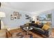 Comfortable living room with stylish furniture, hardwood floors, and natural light at 2681 Leyden St, Denver, CO 80207