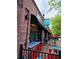 Charming storefront with outdoor seating and awnings at 2681 Leyden St, Denver, CO 80207