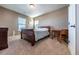 Bright bedroom with a double bed, desk, and window at 2543 Eastview Dr, Castle Rock, CO 80104