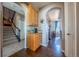 Built-in coffee bar with wood cabinets and granite countertop at 2543 Eastview Dr, Castle Rock, CO 80104