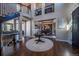 Elegant two-story entryway with hardwood floors and a staircase at 2543 Eastview Dr, Castle Rock, CO 80104