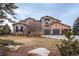 Two-story house with stone accents and a three-car garage at 2543 Eastview Dr, Castle Rock, CO 80104