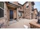 Inviting entryway with a dark door and stone accents at 2543 Eastview Dr, Castle Rock, CO 80104