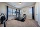 Home gym featuring treadmill and exercise bike at 2543 Eastview Dr, Castle Rock, CO 80104