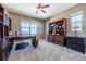 Spacious home office with built-in shelving and window views at 2543 Eastview Dr, Castle Rock, CO 80104