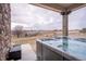 Hot tub on patio with scenic views of the surrounding area at 2543 Eastview Dr, Castle Rock, CO 80104