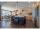 Modern kitchen with island, ample cabinetry, and stainless steel appliances at 2543 Eastview Dr, Castle Rock, CO 80104