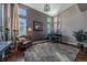 Relaxing music room with hardwood floors and large windows at 2543 Eastview Dr, Castle Rock, CO 80104