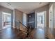 Upstairs hallway with hardwood floors and access to bedrooms and other rooms at 2543 Eastview Dr, Castle Rock, CO 80104