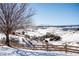 Snowy landscape with mountain views at 2543 Eastview Dr, Castle Rock, CO 80104