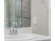 Close-up of a bathroom sink with chrome faucet and modern countertop at 11294 Bella Vita Dr, Broomfield, CO 80020