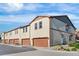 New townhome units, each with a garage, and landscaped front yards at 11294 Bella Vita Dr, Broomfield, CO 80020