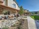 Inviting townhome exteriors, featuring covered porches and professionally maintained landscaping at 11294 Bella Vita Dr, Broomfield, CO 80020