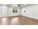Living room with hardwood flooring and natural light, spacious and welcoming at 11294 Bella Vita Dr, Broomfield, CO 80020