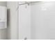 Bright shower featuring white square tiles and a chrome shower head at 11294 Bella Vita Dr, Broomfield, CO 80020