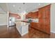 Modern kitchen featuring stainless steel appliances, granite countertops, and a large center island at 160 Pipit Lake Way, Erie, CO 80516